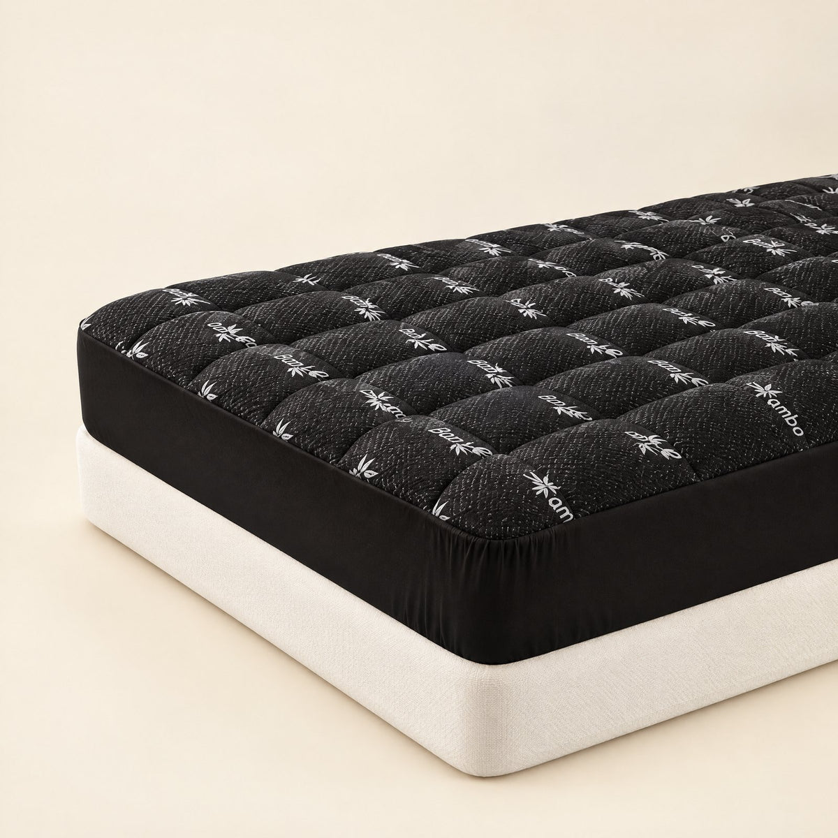 Corner of a mattress with the charcoal Hushloft pillow-top fitted