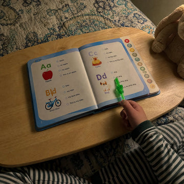 Sample customer photo: reading at bedtime on a lap desk