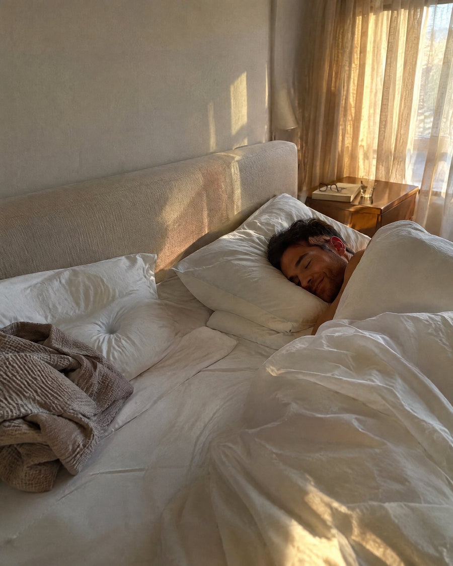 Man still sleeping peacefully in the morning sun