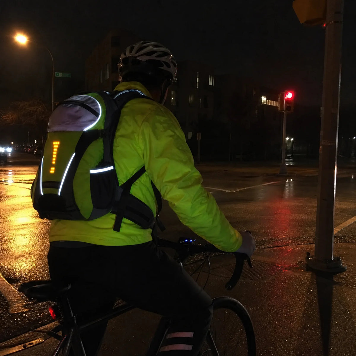 Headlights catching Beacon's reflective strips at a red light