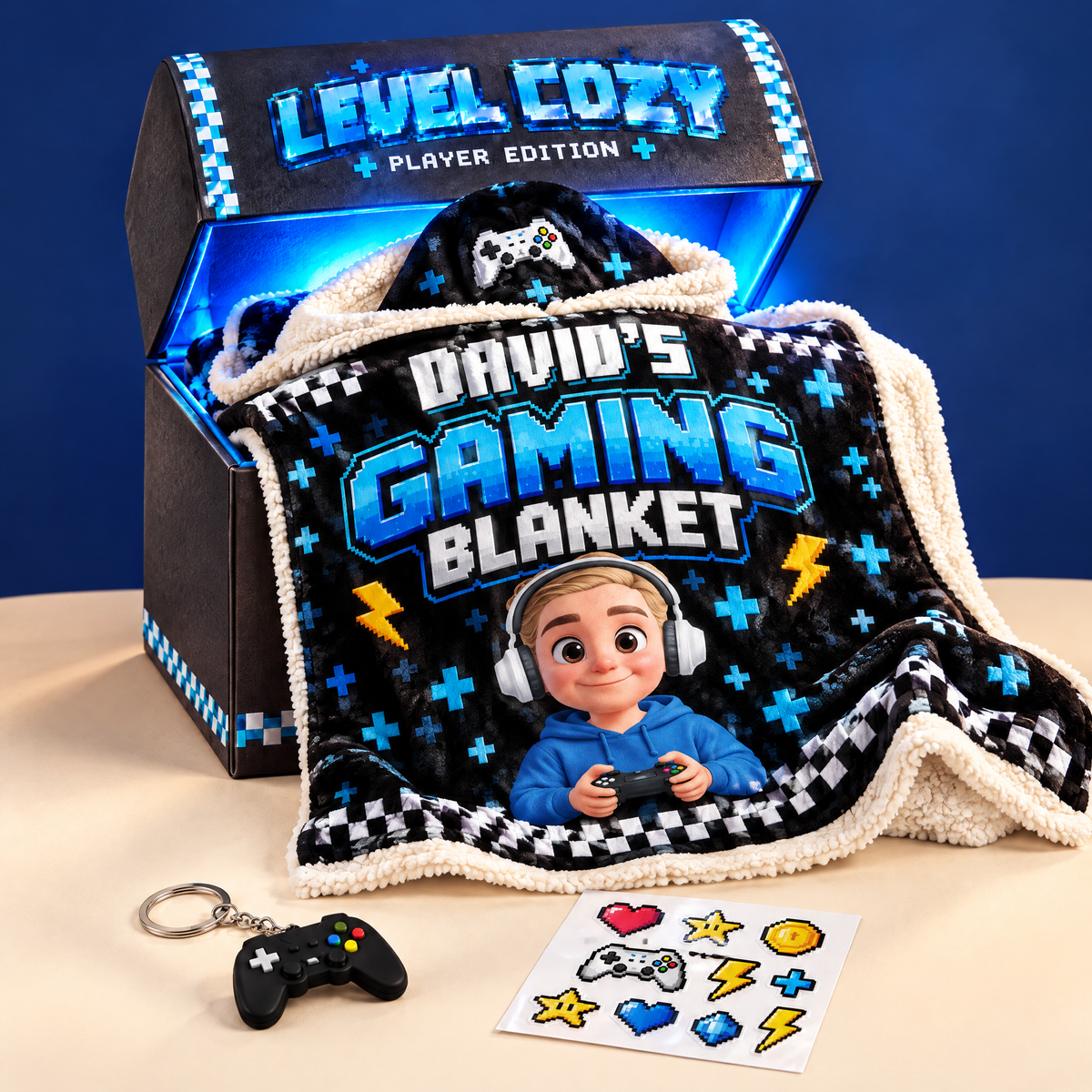Personalized gaming hoodie blanket in the LEVEL COZY loot chest with the free Player Pack keychain and stickers