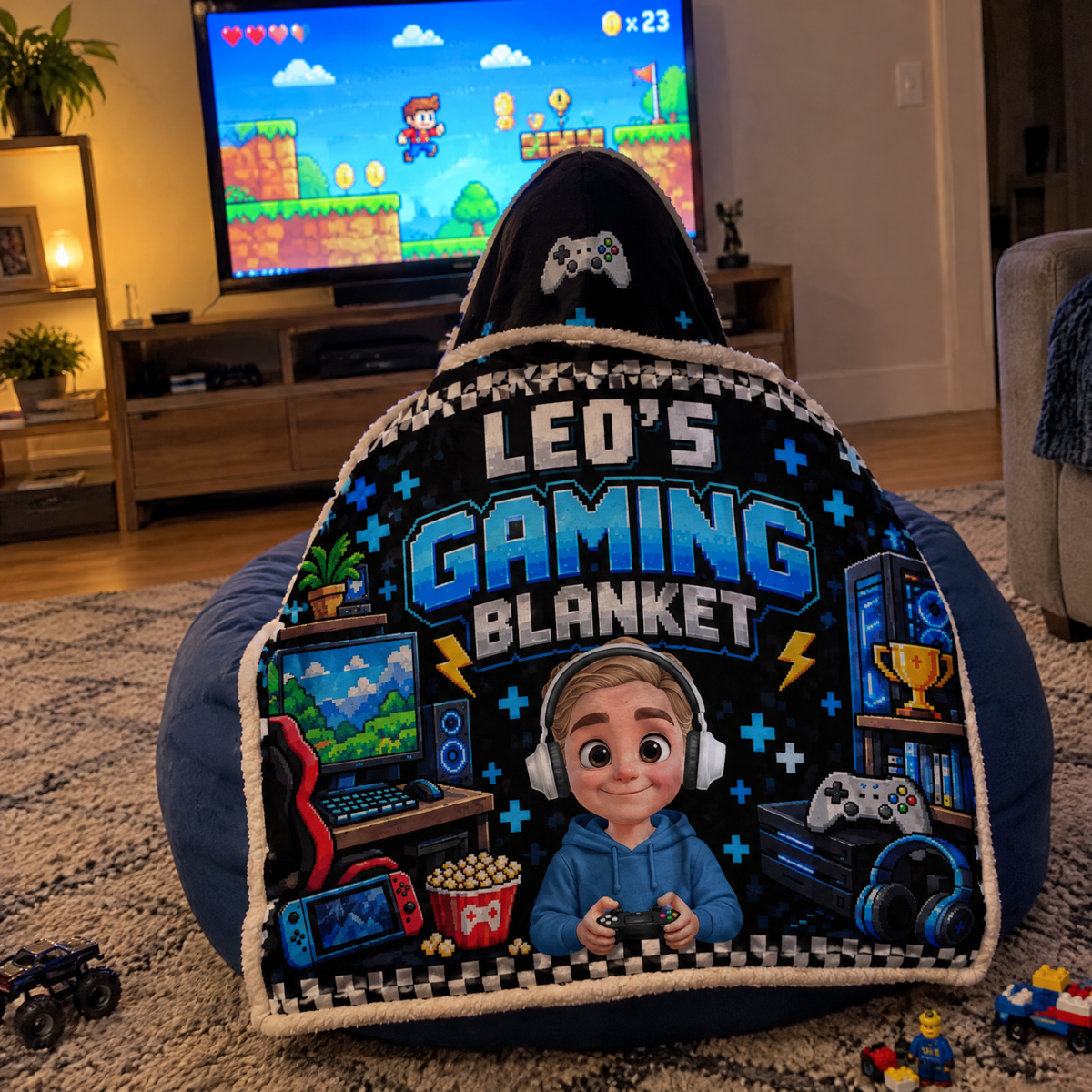 Back of the hoodie blanket showing the printed name while a kid plays