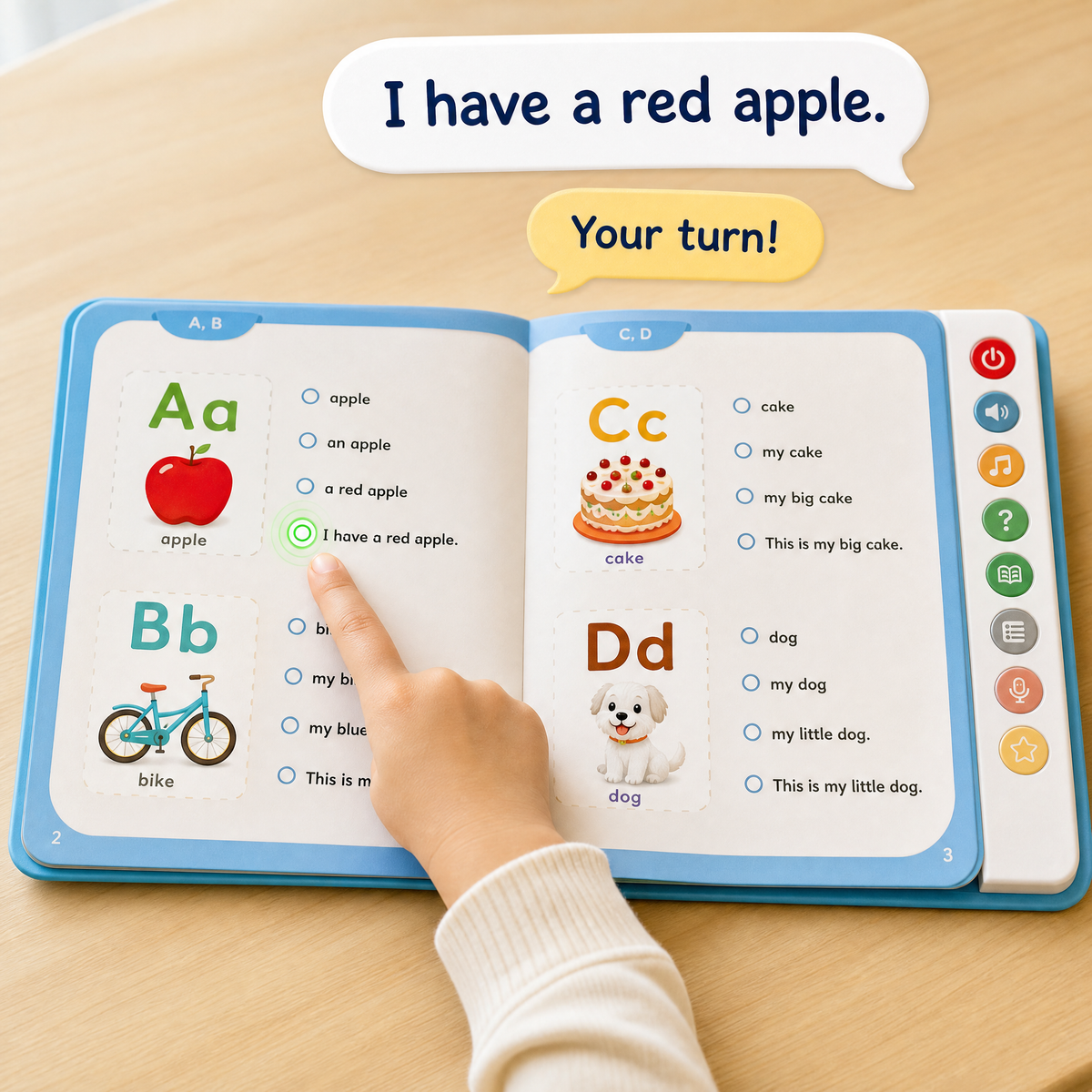 A child taps the dot beside I have a red apple and the book reads it out loud