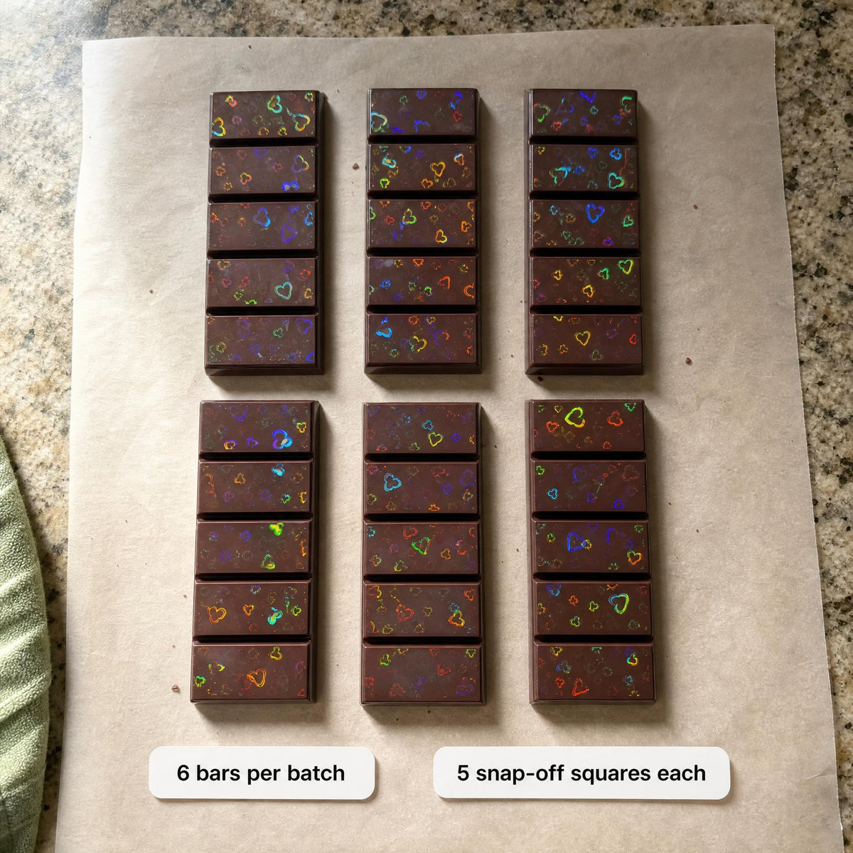 Six rainbow heart chocolate bars from one batch, 5 snap-off squares each