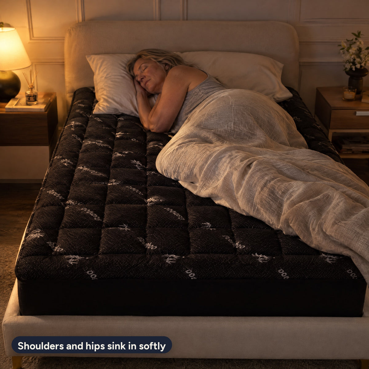 A side sleeper resting on the charcoal pillow-top