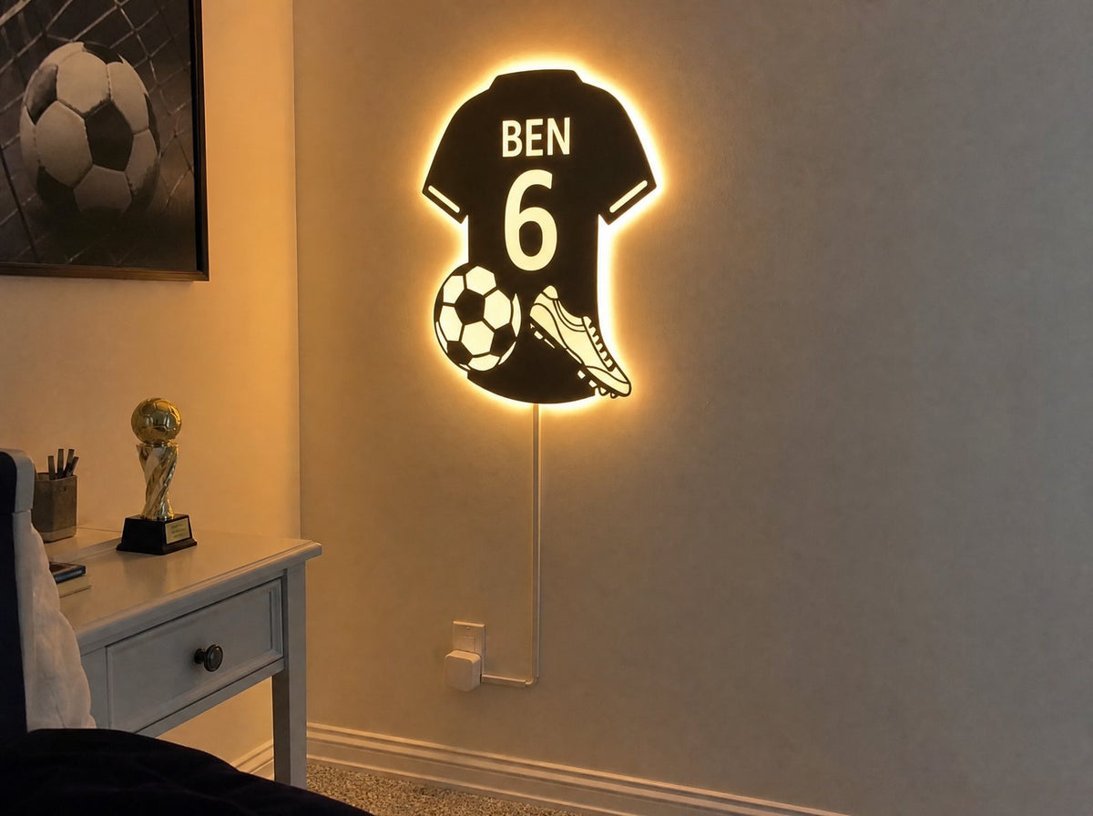Jersey mirror on the wall with a white cable cover running neatly down to the plug