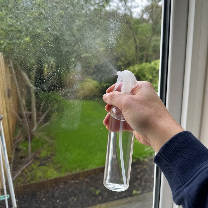 Spraying water on the glass