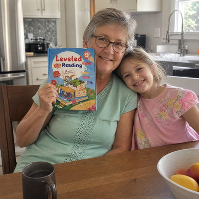 Sample reviewer photo: grandmother holding the Pipit Reader