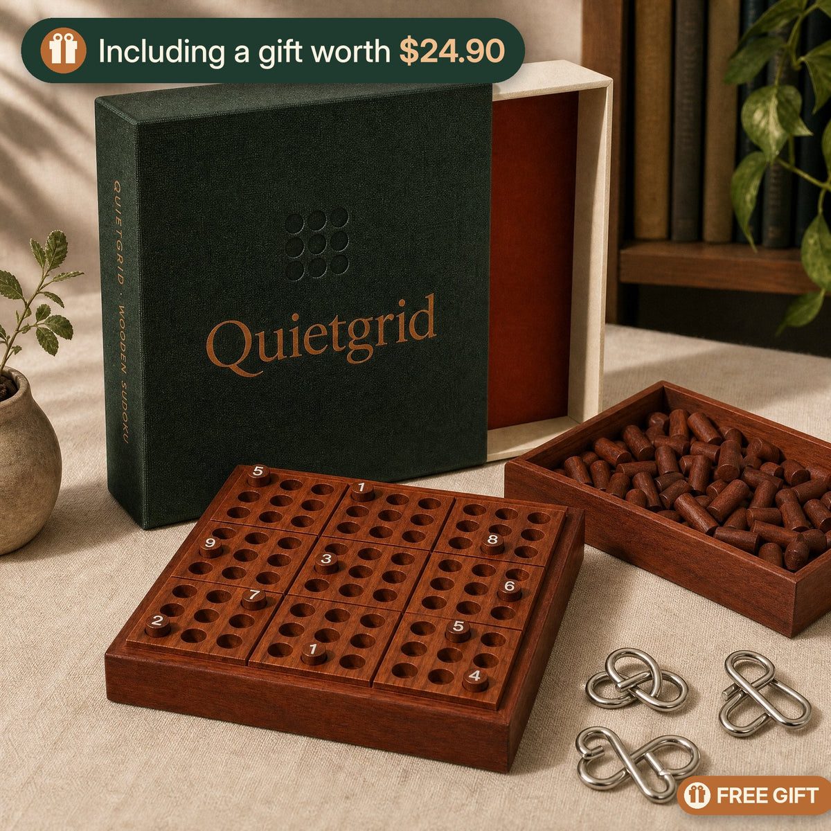 Quietgrid wooden sudoku board with its green slipcase, storage tray and the free Pocket Puzzle Trio, labelled: including a gift worth $24.90