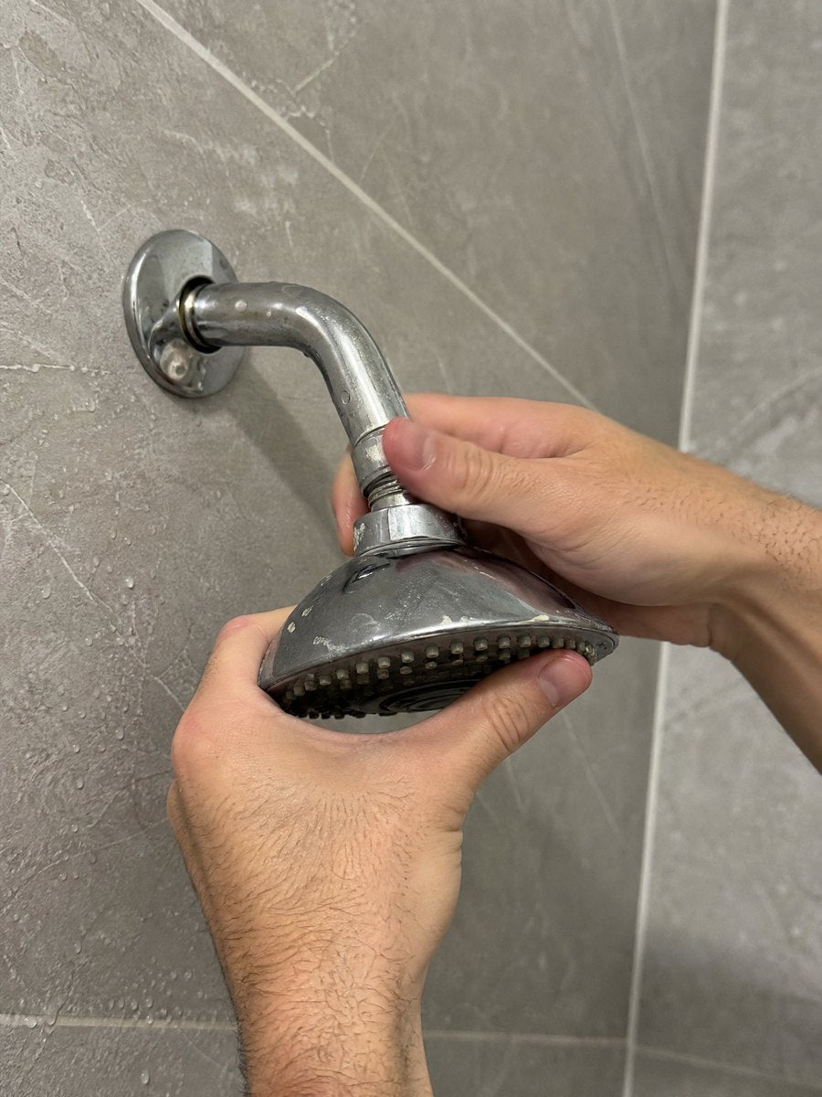 Unscrew the old shower head