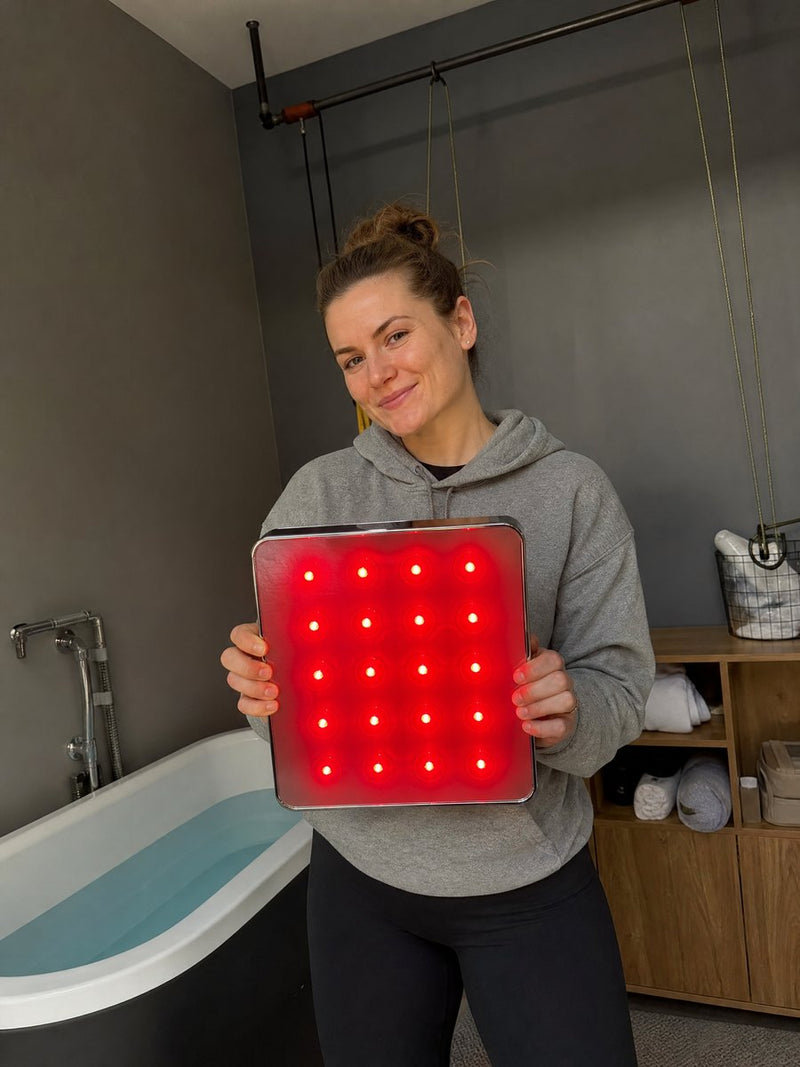 Recovery coach holding the glowing rainfall head