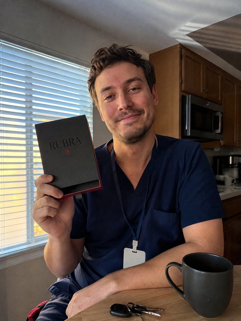Night-shift nurse holding the RUBRA box