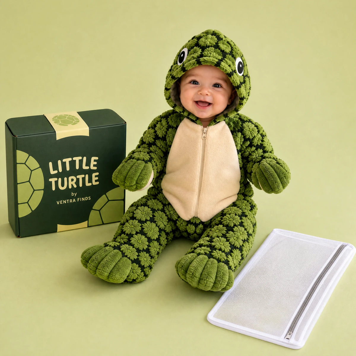 Little Turtle plush baby onesie with branded packaging and one care bag