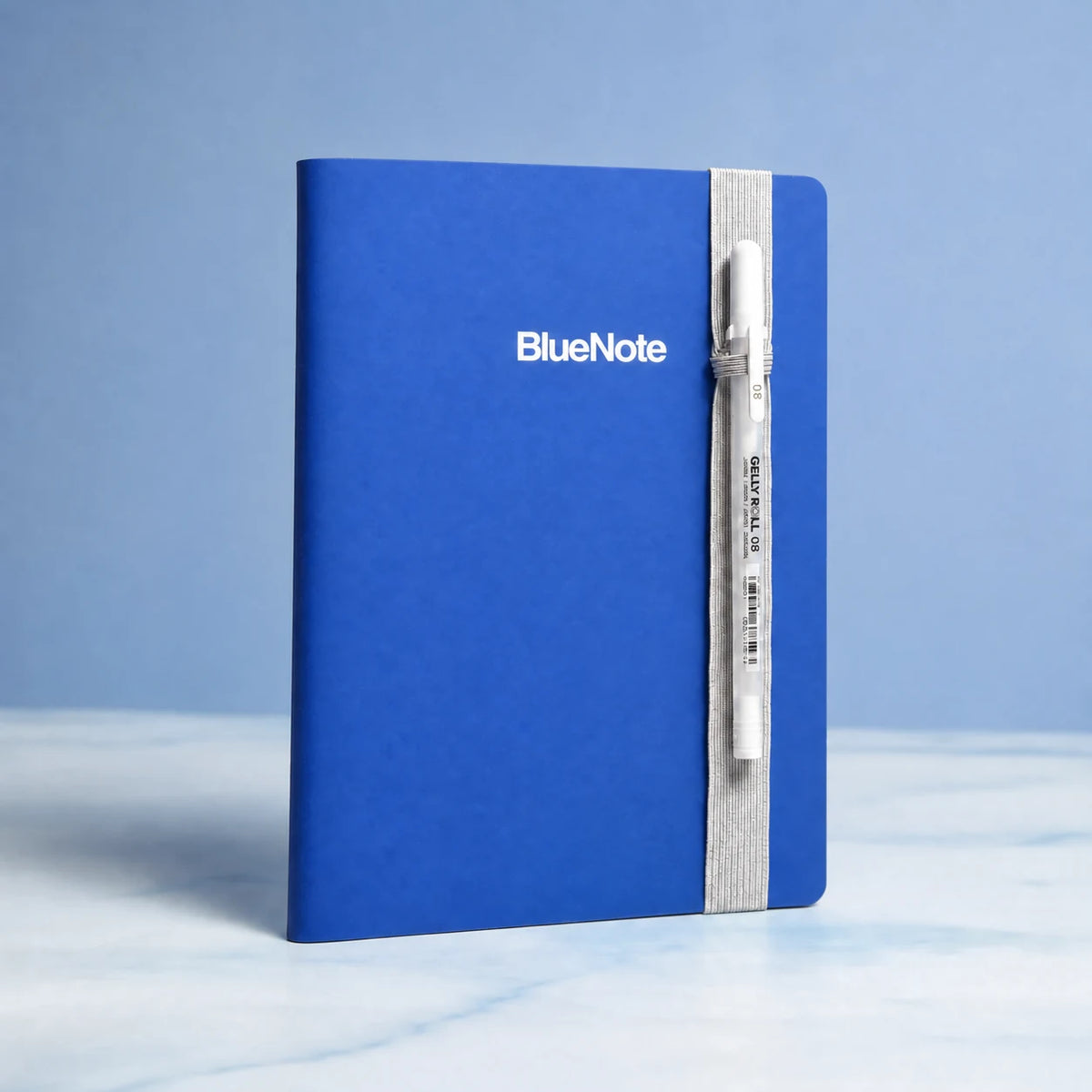 BlueNote soft-touch notebook cover and included white pen.