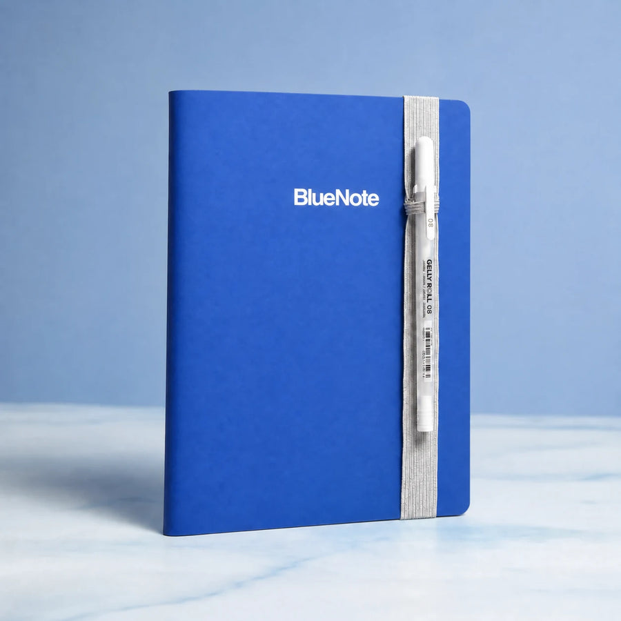 BlueNote soft-touch notebook cover and included white pen.