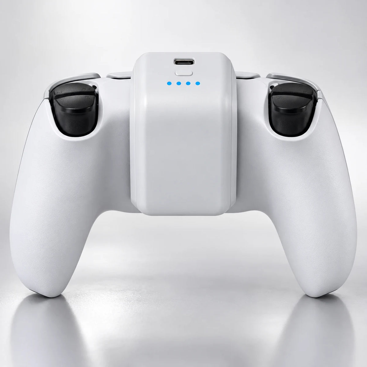 PlayPack mounted on a standard PS5 DualSense controller; controller not included